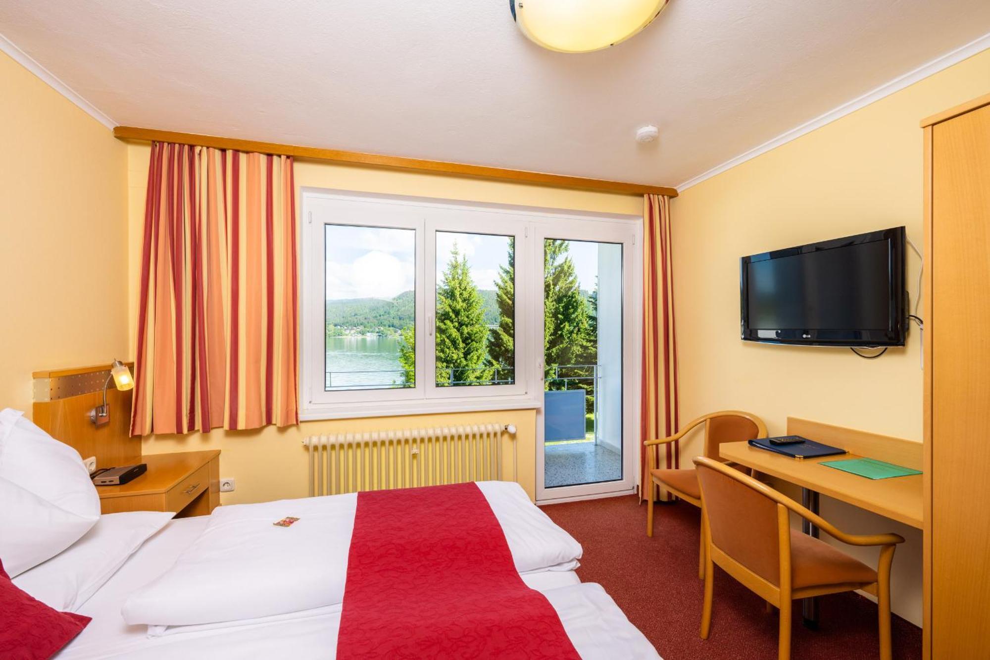 Strandhotel Schabus Фельден-ам-Вёртер-Зе Номер фото